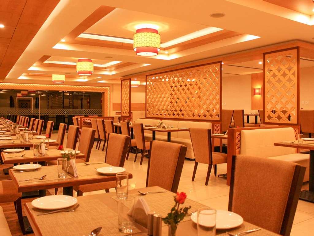维哈品质酒店 库姆巴科纳姆 餐厅 照片